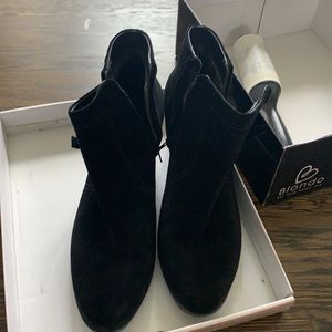 Blonde black suede shoes